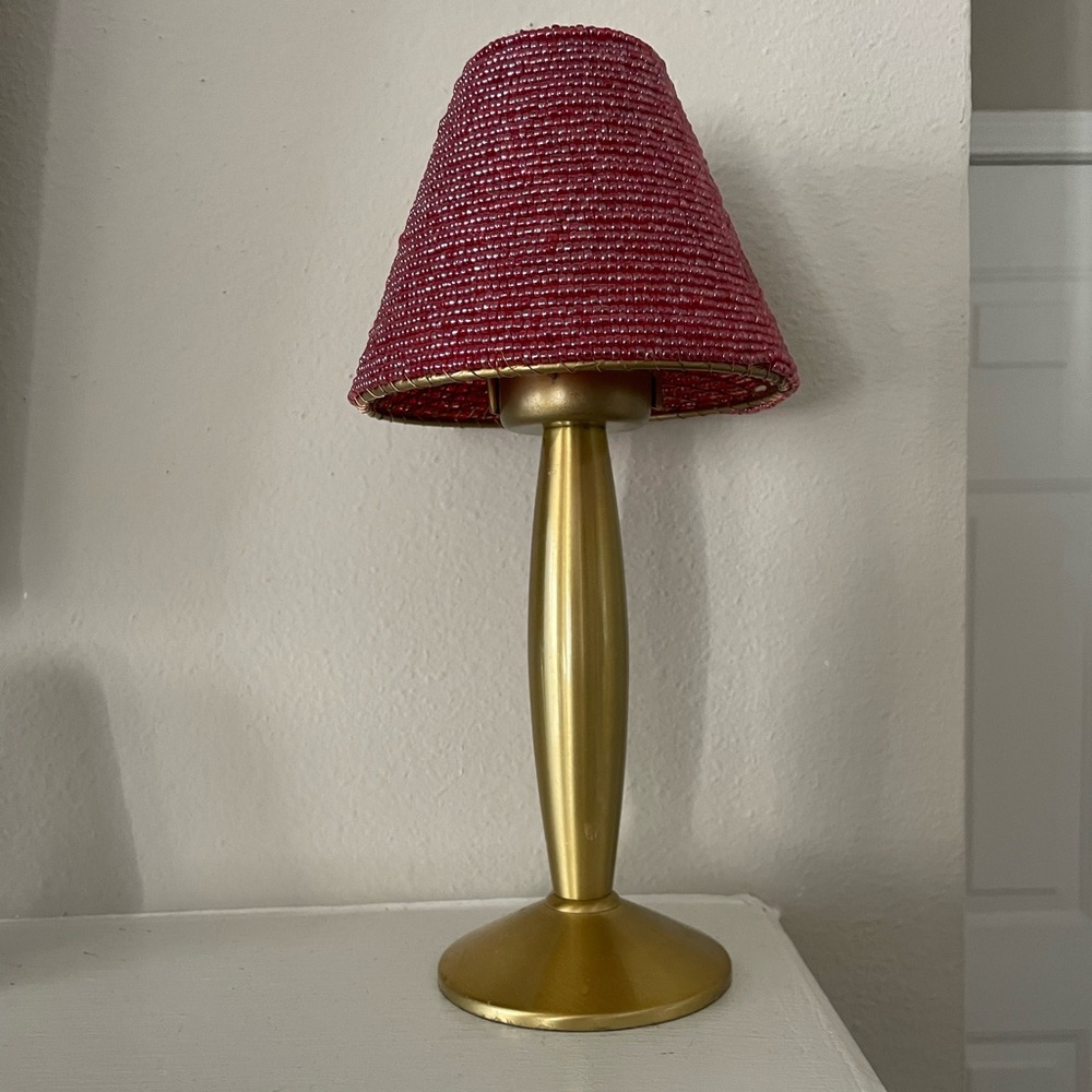 Small candle holder with beaded lampshade